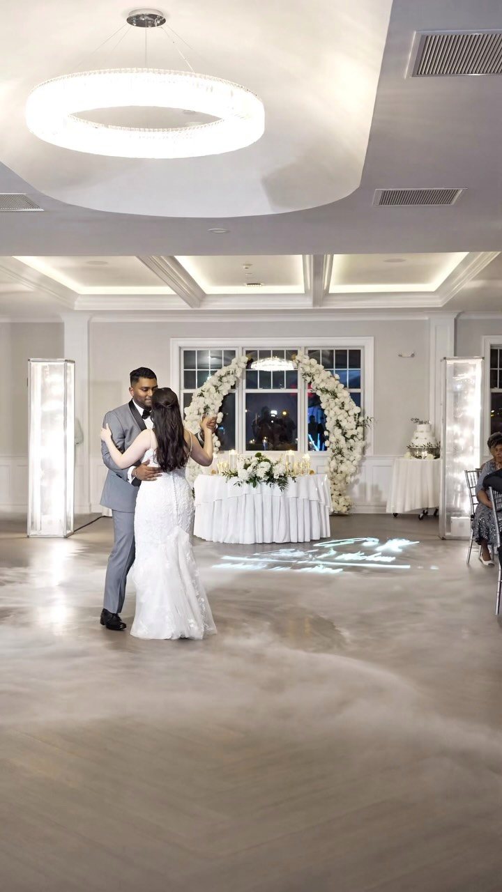 First dance in a white ballroom